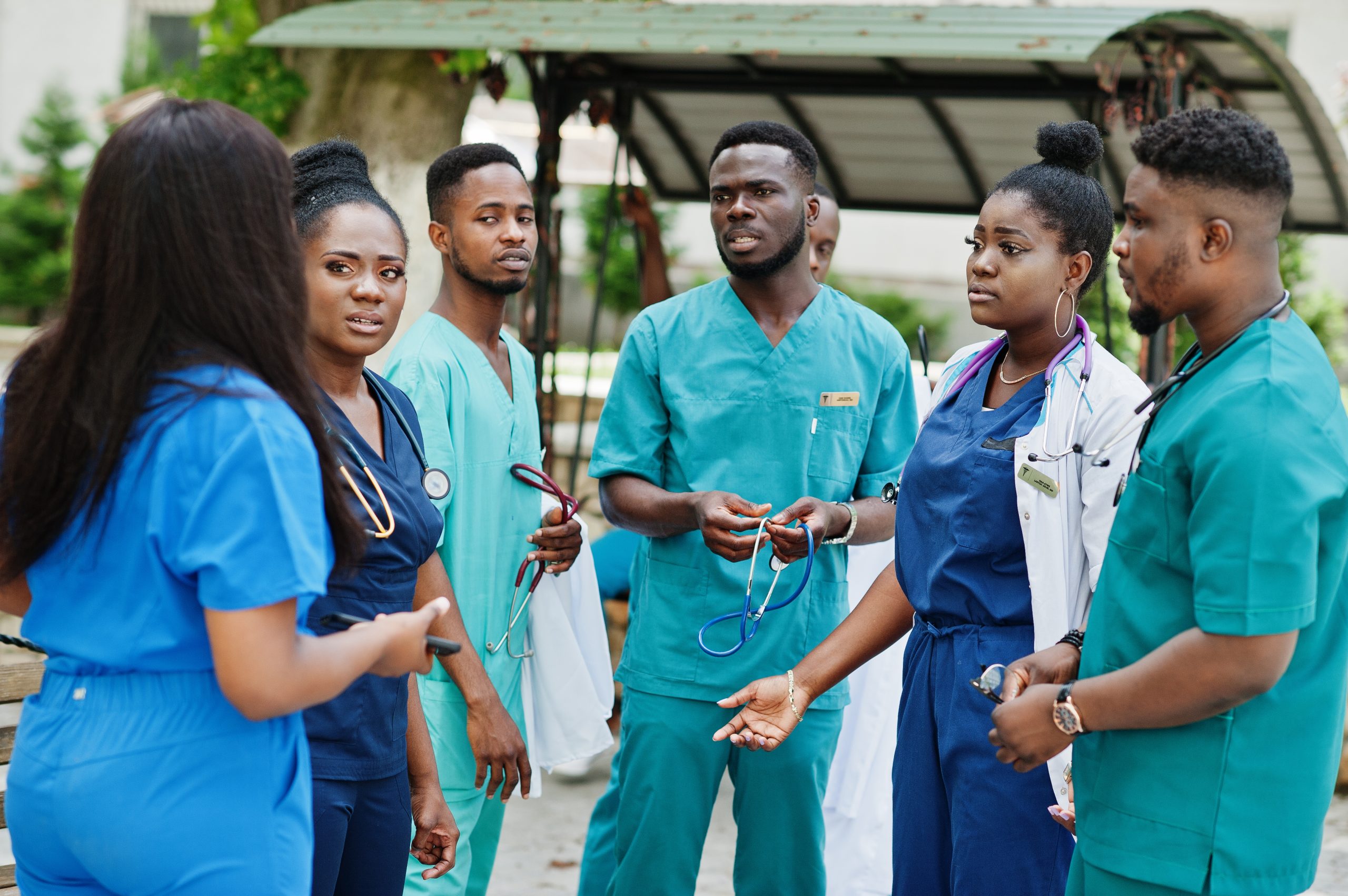 group of african medical students posed outdoor.